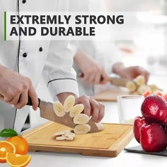 Bamboo chopping board with handle and juice groove