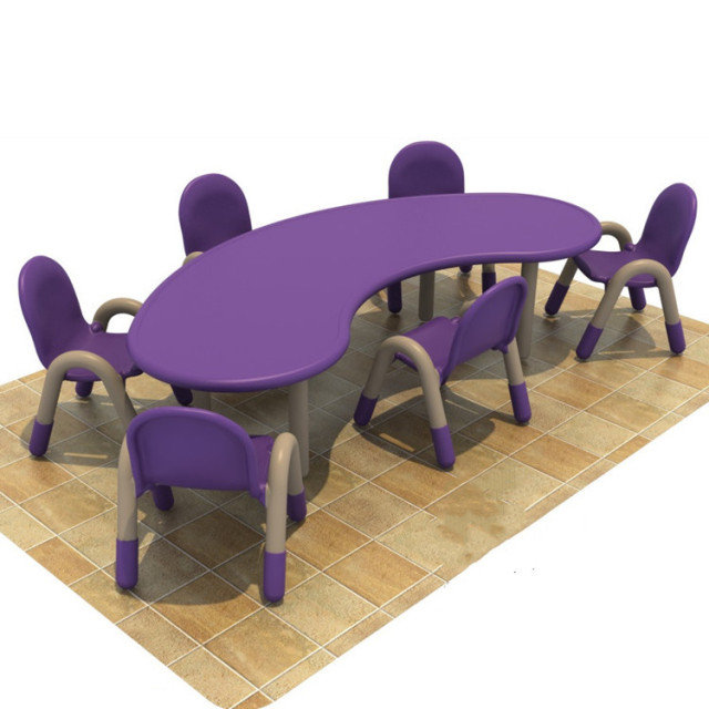 Kindergarten children study writing drawing dining table