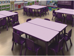 Kindergarten children study writing drawing dining table