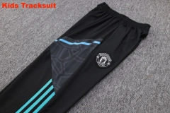 Kids Manchester United 23/24 Half-Zip Training Sweatshirt and Pants Set White E714