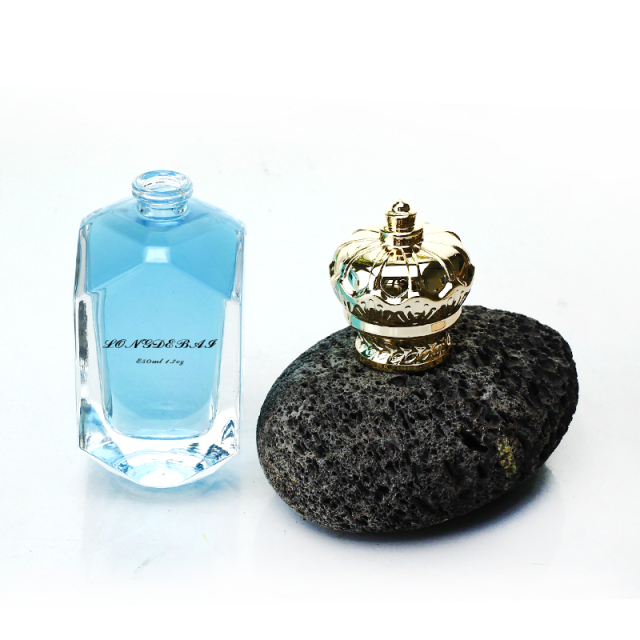New design luxury crystal shape empty parfum bottle clear gold crown cover crimp 50ml glass perfume bottle with aluminum label