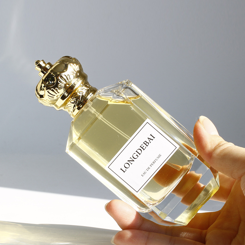 OEM luxury gold cap empty 100ml parfum bottle clear crystal shape crimp glass perfume bottle with custom label