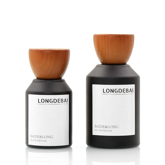 LONGDEBAI Luxury Custom Empty Round Glass Spray Bottles 30ml 50ml 100ml Crimp Perfume Bottle with Wooden Lid