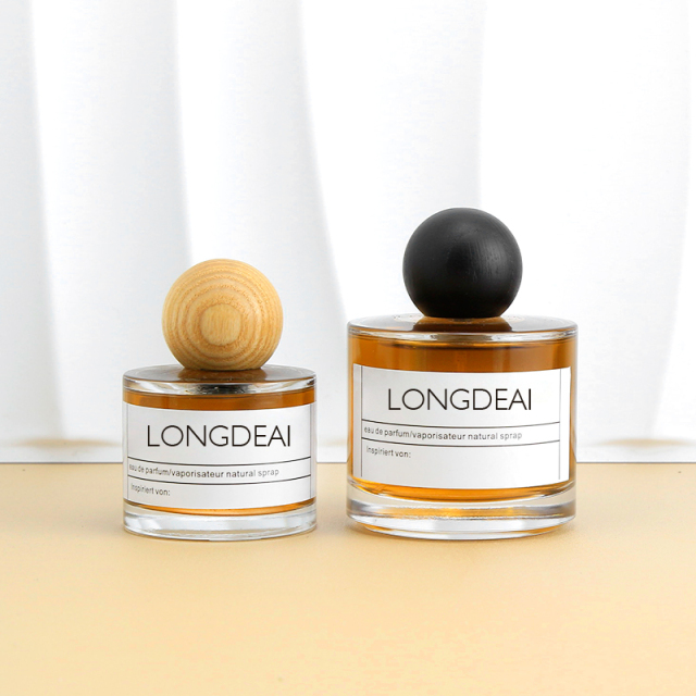 Wholesale round 30ml glass perfume bottle 50ml 100ml with wooden caps