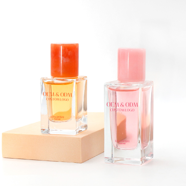 Wholesale square clear glass perfume bottle 30ml 50ml 100ml crimp empty perfume bottle with Resin cap