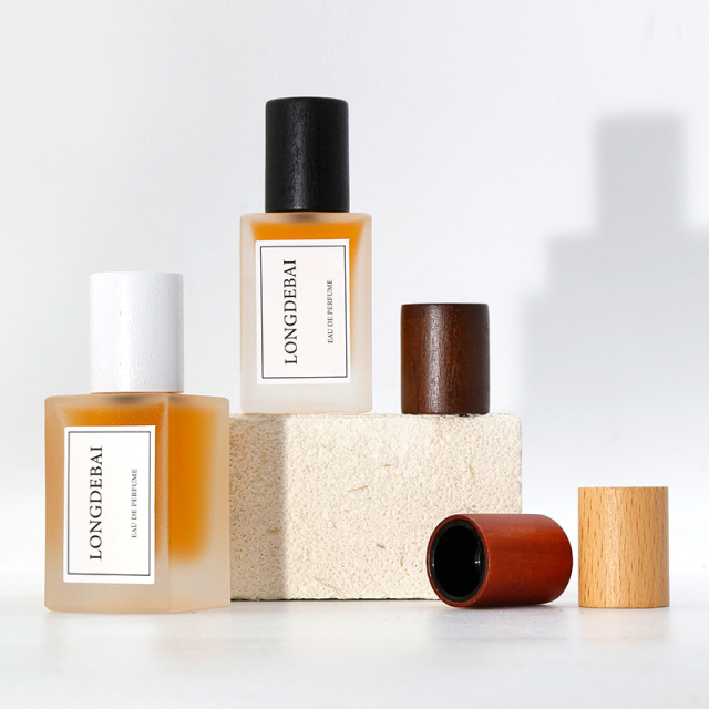 Luxury clear perfume spray bottle empty crimp aluminum pump square frosted 30ml 50ml 100ml perfume bottle with box and wood cap