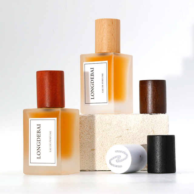 Luxury clear perfume spray bottle empty crimp aluminum pump square frosted 30ml 50ml 100ml perfume bottle with box and wood cap