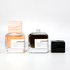 New Arrival Custom Empty Irregular Shape Clear Perfume Bottle Glass 50ml Elegant Marble Cover Perfume Spray Bottle For Oil