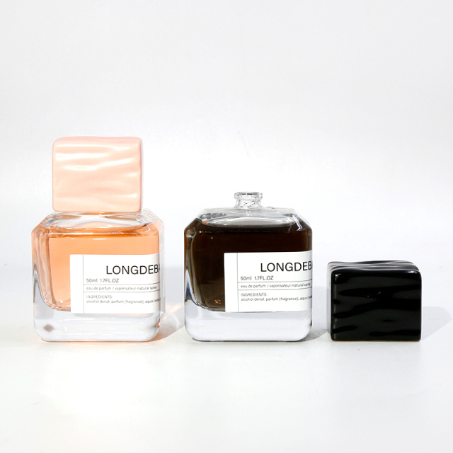 New Arrival Custom Empty Irregular Shape Clear Perfume Bottle Glass 50ml Elegant Marble Cover Perfume Spray Bottle For Oil