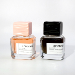 New Arrival Custom Empty Irregular Shape Clear Perfume Bottle Glass 50ml Elegant Marble Cover Perfume Spray Bottle For Oil