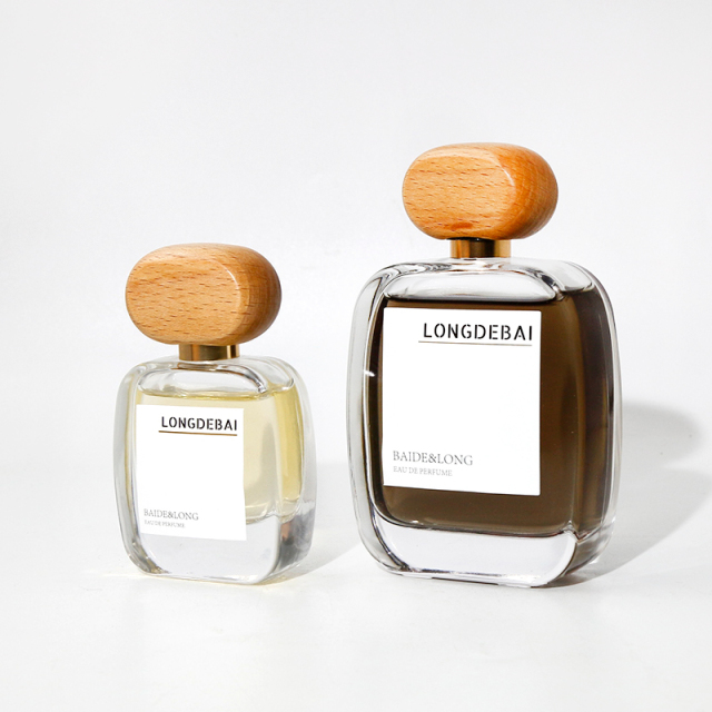 Wholesale flat perfume glass bottle crimp empty aluminum sprayer clear 30ml 50ml 100ml perfume bottle with wood cap