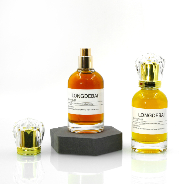 Custom luxury round clear crimp perfume bottle 30ml 50ml 100ml pump sprayer perfume glass bottle with acrylic cap and box
