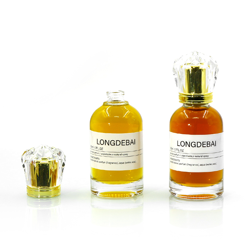 Custom luxury round clear crimp perfume bottle 30ml 50ml 100ml pump sprayer perfume glass bottle with acrylic cap and box