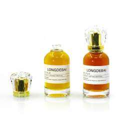 Custom luxury round clear crimp perfume bottle 30ml 50ml 100ml pump sprayer perfume glass bottle with acrylic cap and box