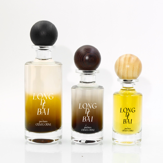 wholesale Custom crimp round clear perfume spray bottle 30ml 50ml 100ml empty perfume glass bottle with wooden cap