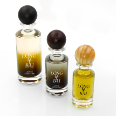 wholesale Custom crimp round clear perfume spray bottle 30ml 50ml 100ml empty perfume glass bottle with wooden cap