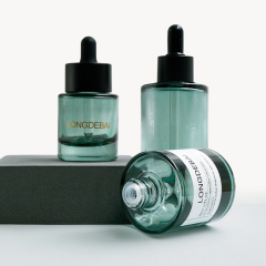 Customized dark green rubber dropper essential oil bottle 50ml 100ml empty glass essential oil bottle, rubber dropper, as a gift