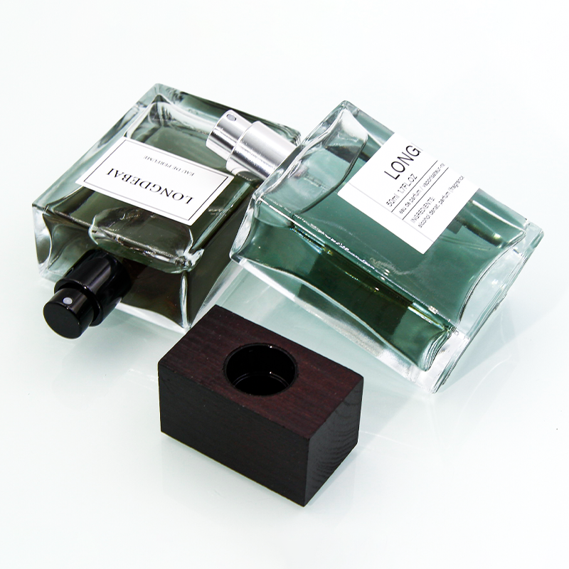 Glass perfume bottle with flat square wood cover, portable perfume bottle