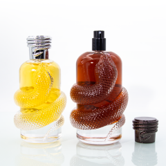 New arrival custom Year of the snake luxury irregular shape crimp 100ml 150ml glass perfume bottle