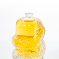 New arrival custom Year of the snake luxury irregular shape crimp 100ml 150ml glass perfume bottle