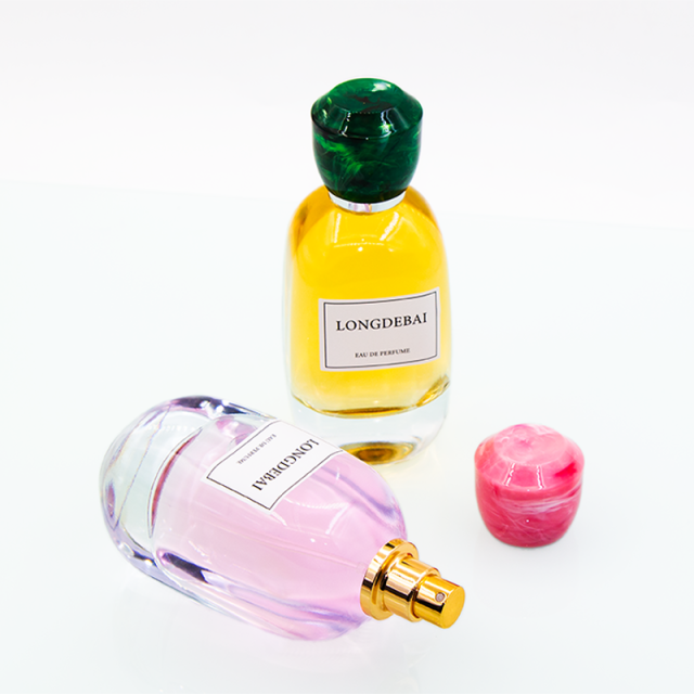 Wholesale luxury round thick bottom empty clear glass perfume bottle with resin cap