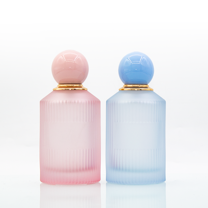 In stock luxury frost pink blue 100ml round glass perfume bottle with ball cap