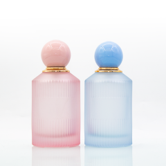 In stock luxury frost pink blue 100ml round glass perfume bottle with ball cap