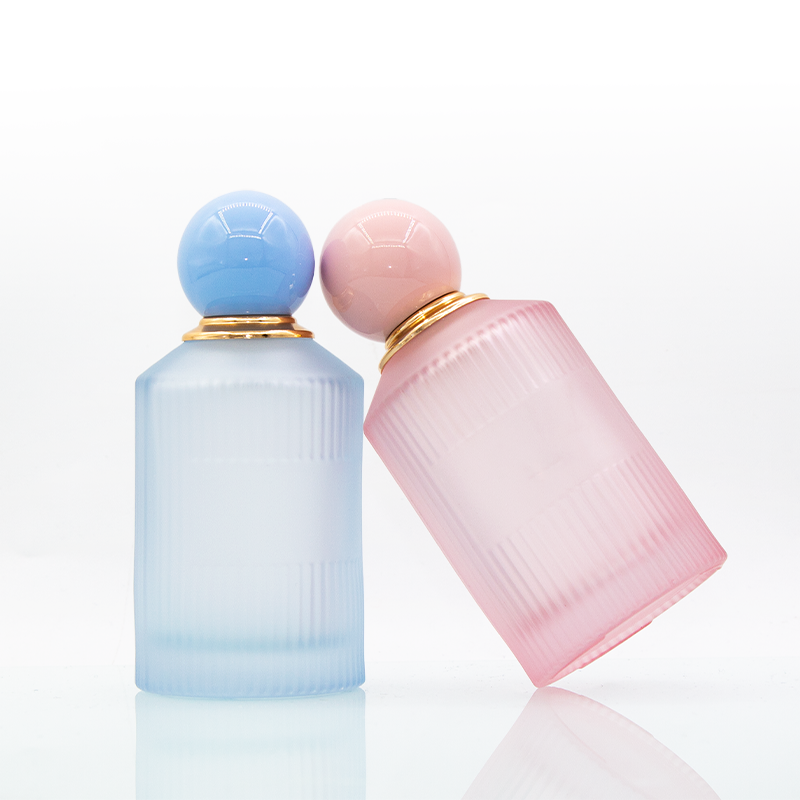 In stock luxury frost pink blue 100ml round glass perfume bottle with ball cap