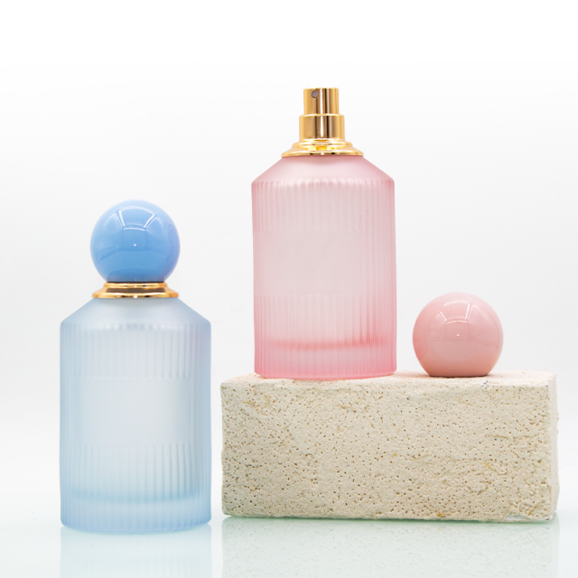 In stock luxury frost pink blue 100ml round glass perfume bottle with ball cap
