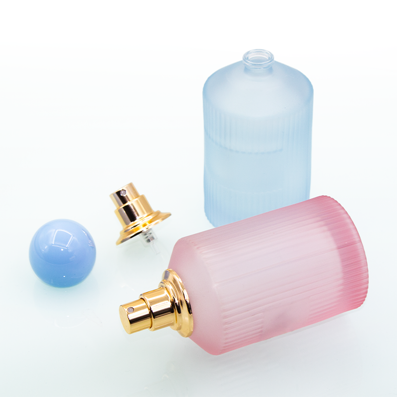 In stock luxury frost pink blue 100ml round glass perfume bottle with ball cap