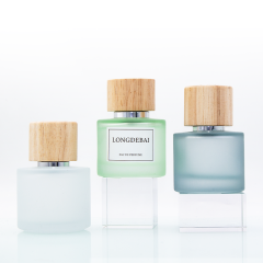 Wholesale empty frost green blue round 50ml glass perfume bottle with wooden lid