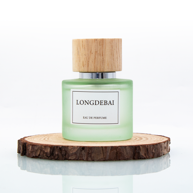 Wholesale empty frost green blue round 50ml glass perfume bottle with wooden lid