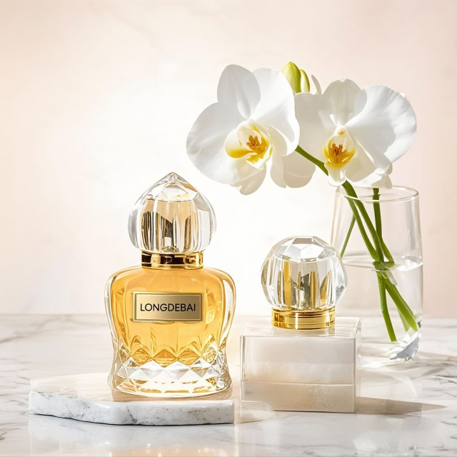Luxury unique crown shape crimp glass perfume bottle 50ml 100ml with zamac acrylic cap