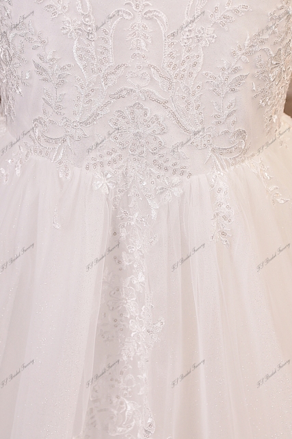 Glitter Tulle Mermaid Wedding Dress With Deep V-neck And Lace Appliqués