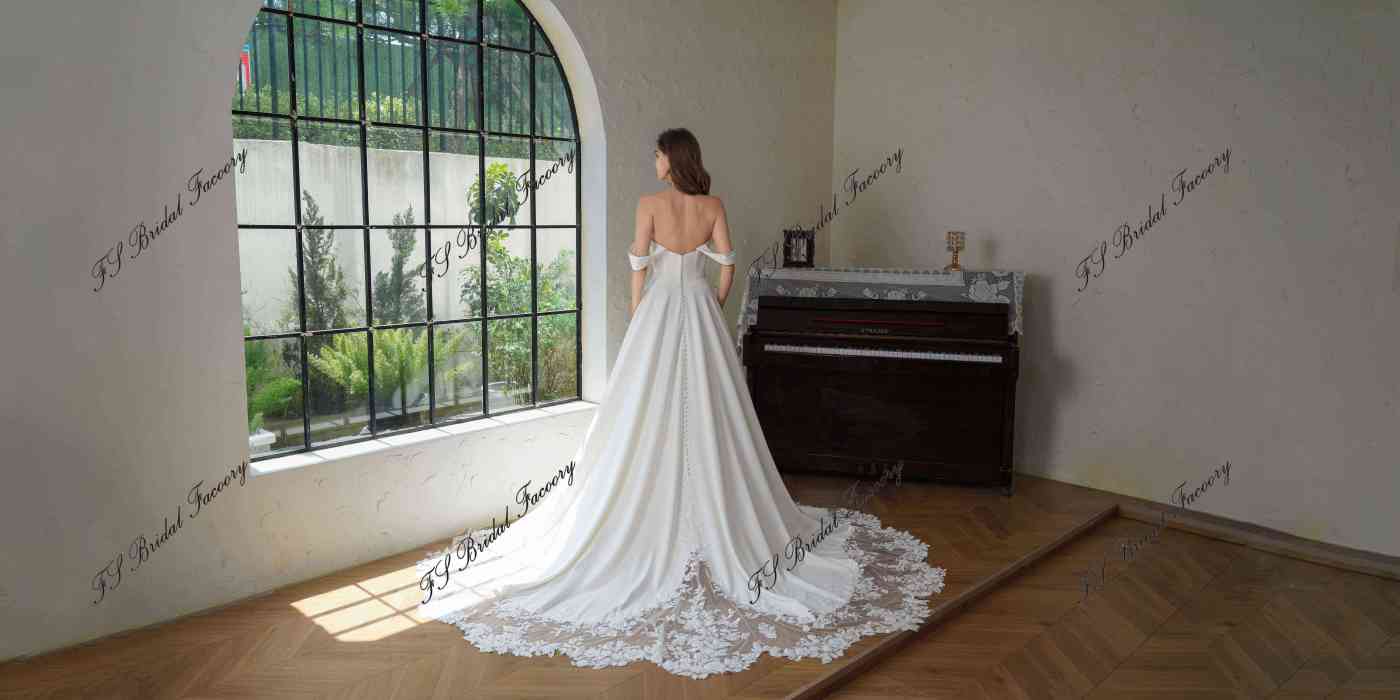 Crepe A-Line Gown With Pocket And Dramatic Lace Train