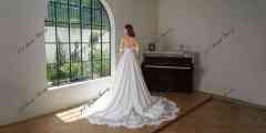 Crepe A-Line Gown With Pocket And Dramatic Lace Train