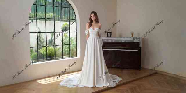 Crepe A-Line Gown With Pocket And Dramatic Lace Train