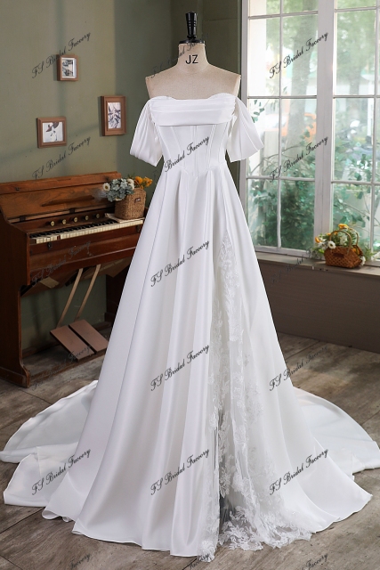 A Silhouette Satin Bridal Gown With Split Skirt