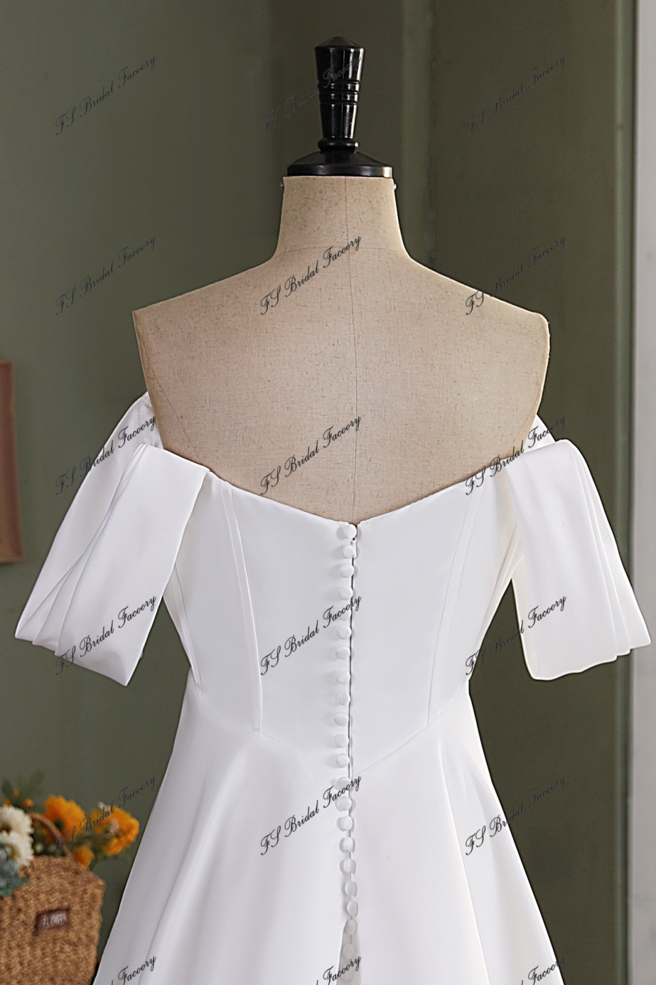 A Silhouette Satin Bridal Gown With Split Skirt