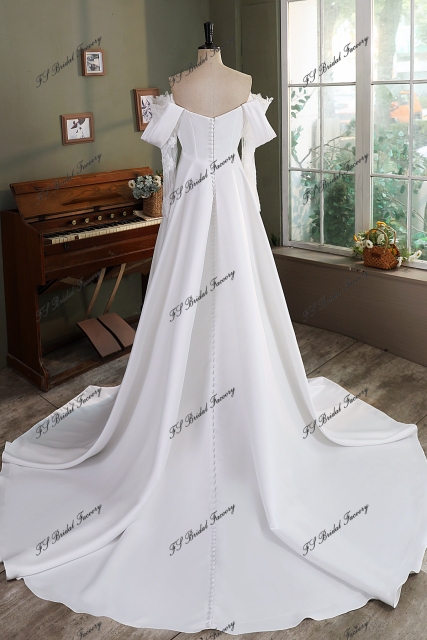 A Silhouette Satin Bridal Gown With Split Skirt