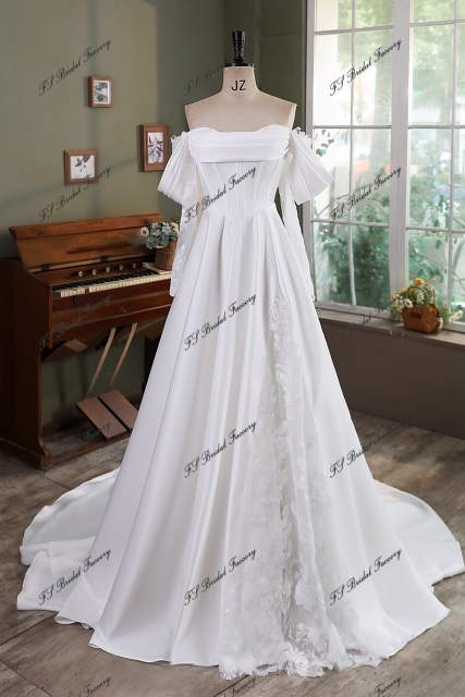 A Silhouette Satin Bridal Gown With Split Skirt