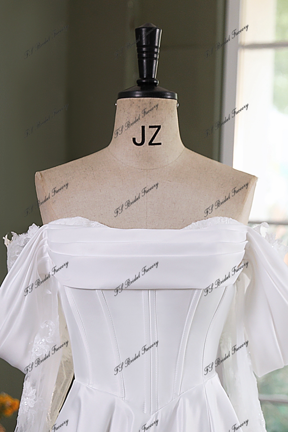 A Silhouette Satin Bridal Gown With Split Skirt