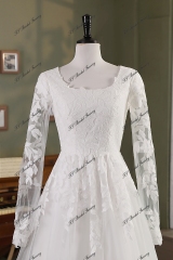 Modest Long Sleeve Tulle Wedding Gown With Slit