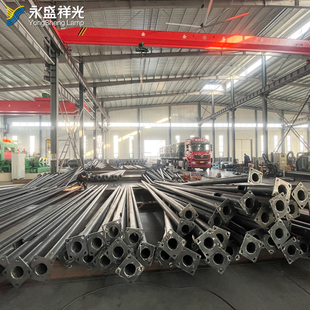 Hot dip galvanized 7m 8m 9m 10m 11m 12m solar street light post with single arm round tapered eco-friendly street light pole for