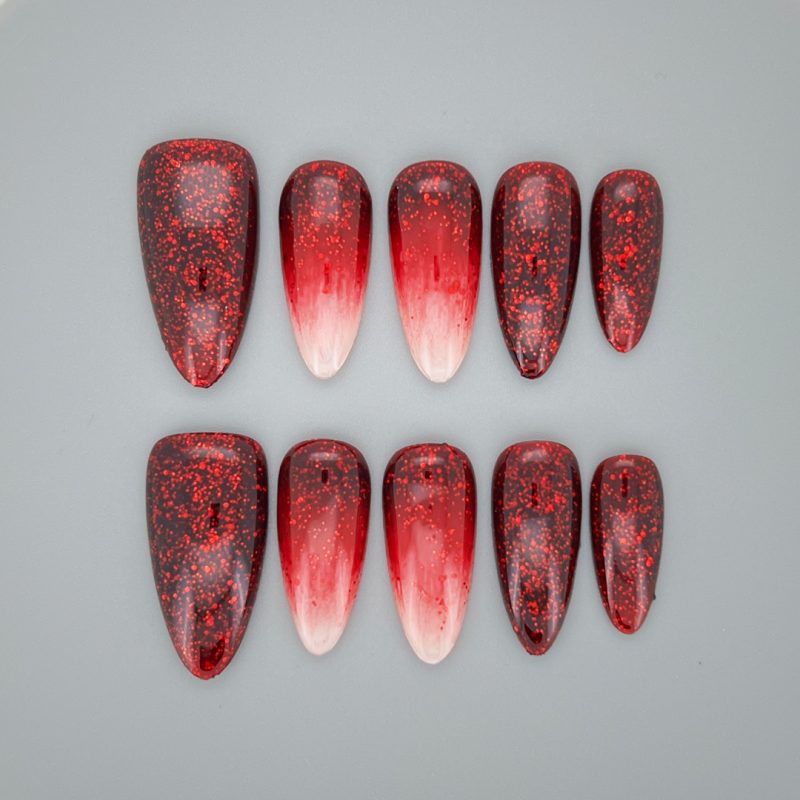 Fiesta Glam medium almond press-on nails with bright fuchsia pink glossy finish