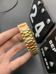 Rolex Day-Date gold watch 228238