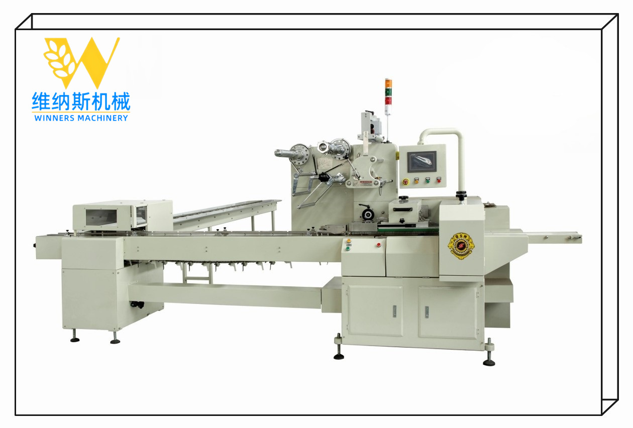 MÁQUINA DE EMBALAJE DE GALLETAS EN EL BORDE