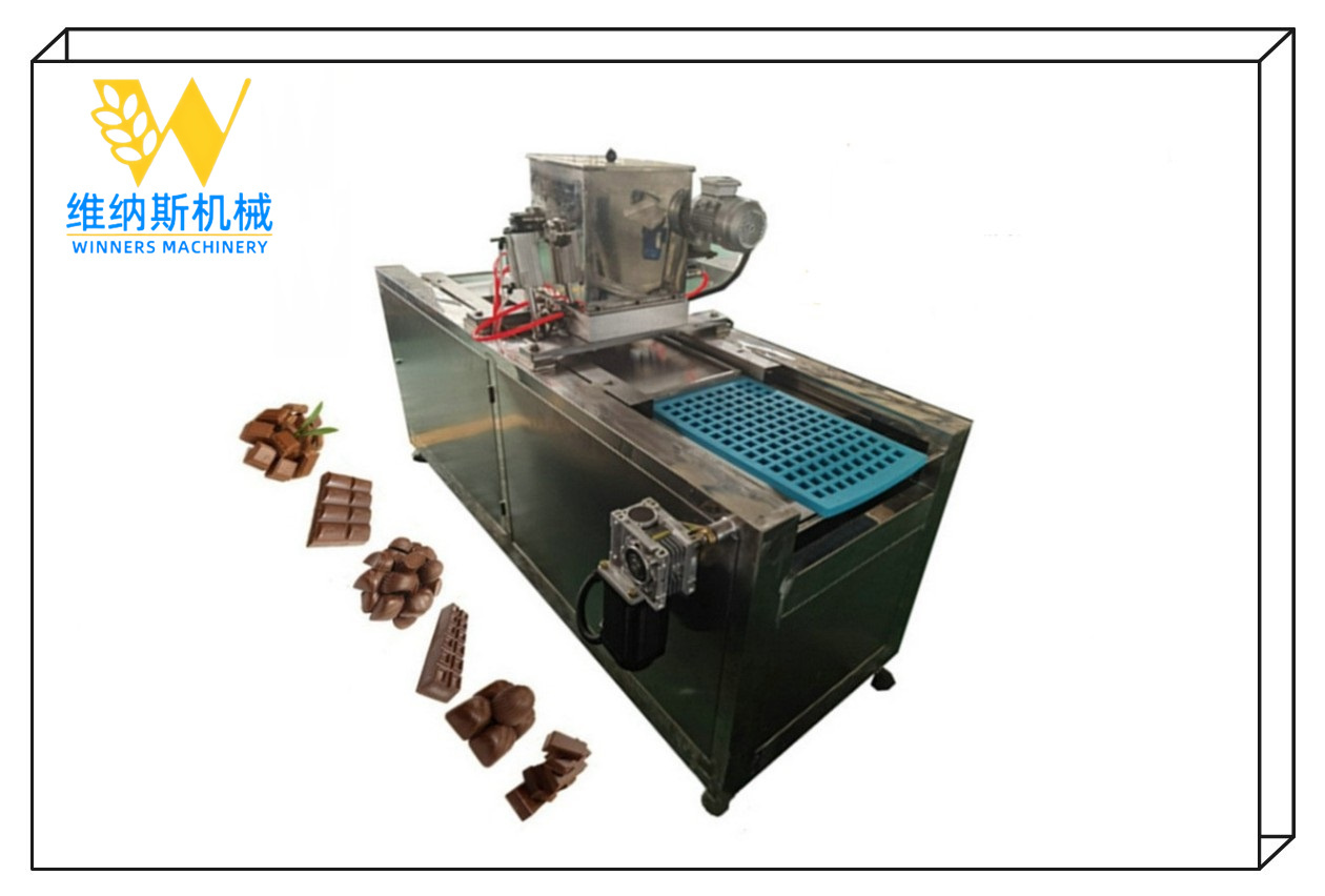 PEQUEÑA MÁQUINA FORMADORA DEPOSITADORA DE CHOCOLATE