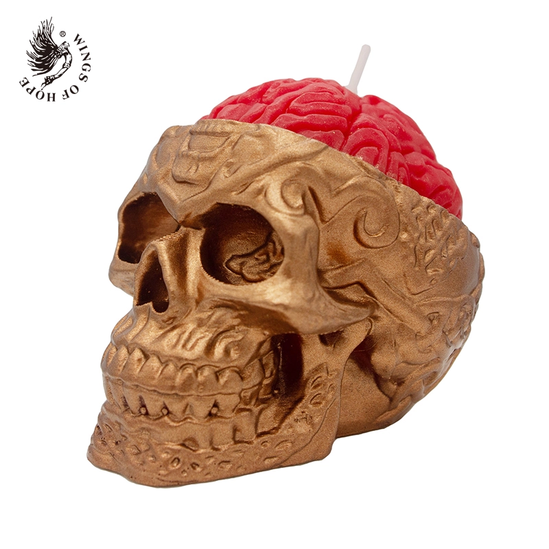 Brain opened rose gold skull candle, full product view
