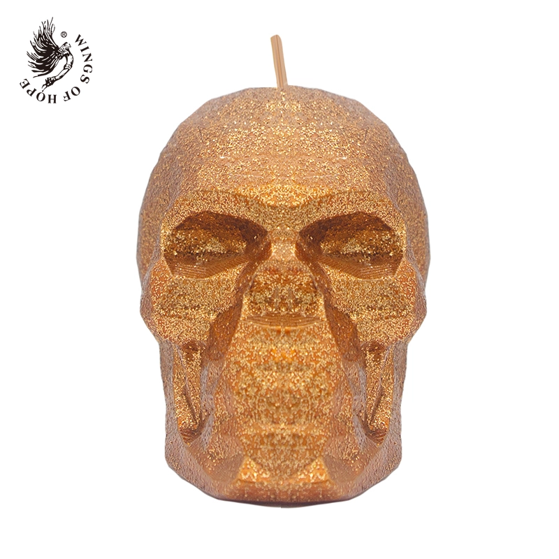 Halloween glitter multicolor skull candle in close-up product view